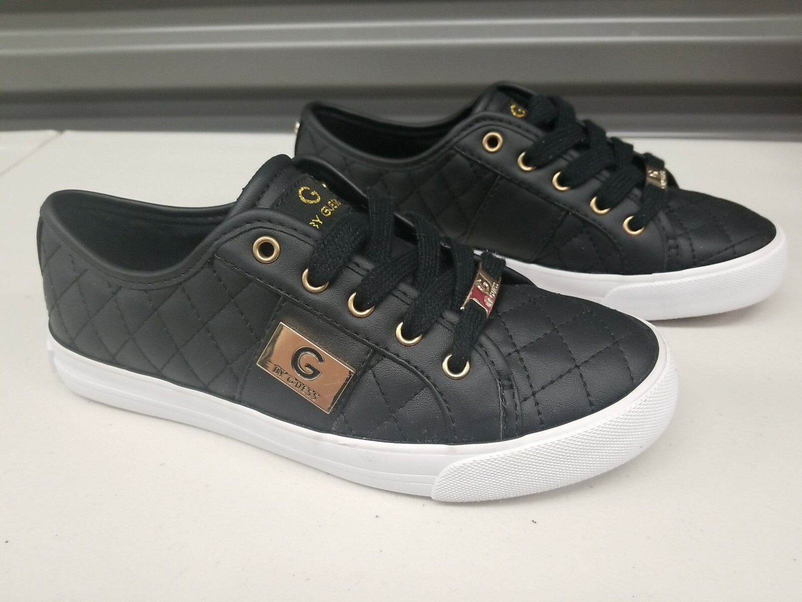 g by guess high top sneakers