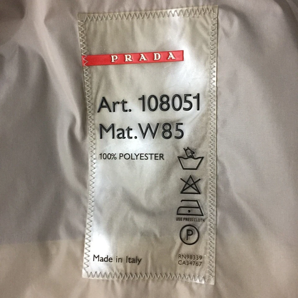 Chaqueta de lluvia PRADA Italia azul con bolsillos con cremallera logotipo herrajes para mujer talla pequeña/mediana Foto 2 de 4