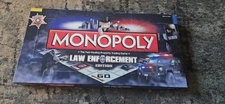 Law Enforcement Edition Monopoly. 100% complete. Good used condition!