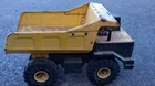 Tonka Pressed Steel Yellow Black Dump Truck Construction Vehicle Toy