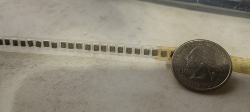 Reel of 4,000 Johanson .01uF 50VDC Ceramic Chip Capacitors P/N 500S41W103MV4E - Picture 4 of 5