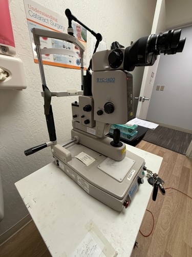 Nidek YC-1400 Ophthalmic YAG laser with Integrated Slit Lamp