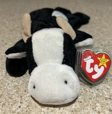 Ty Vintage Beanie Baby , Daisy The Black And White Cow With Tag Attached.