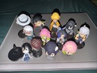 12 piece Demon Slayer: Kimetsu no Yaiba mini figure lot — photo 1