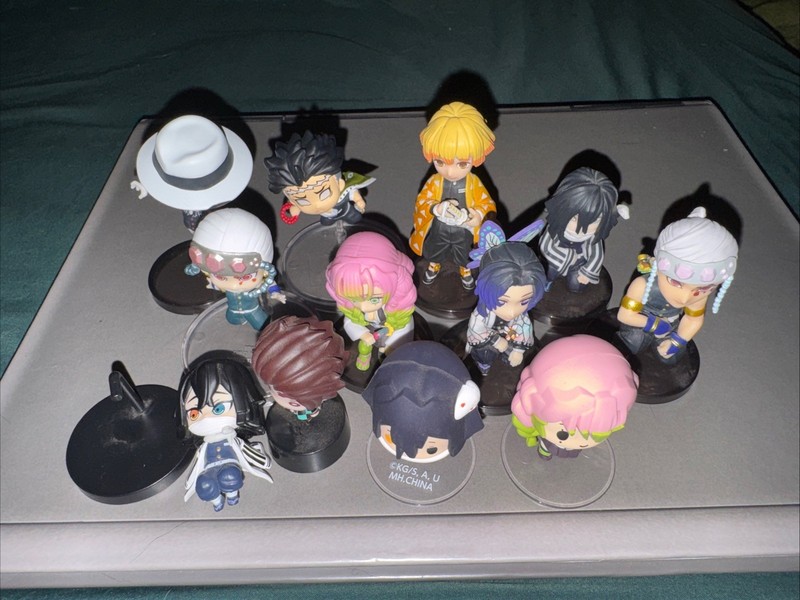 12 piece Demon Slayer: Kimetsu no Yaiba mini figure lot