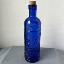 Vintage Cobalt Blue Glass Bottle with Grapes and Leaf Motif. Includes Cork