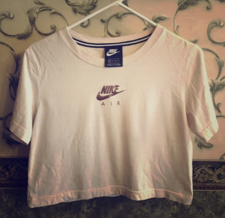 white and rose gold nike shirt