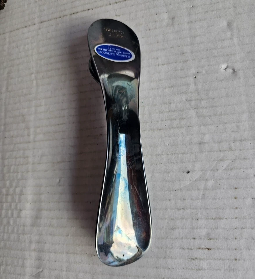 Cuerno de zapato pesado vintage enchapado en plata Reed & Barton con mango de anillo de máscara de león Foto 3 de 4