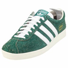 green and white adidas gazelle