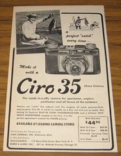 1951 AD~CIRO 35 35MM CAMERA~MAN & STRINGER OF FISH