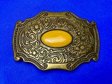 yellow enamel centerpiece on Western framed belt buckle