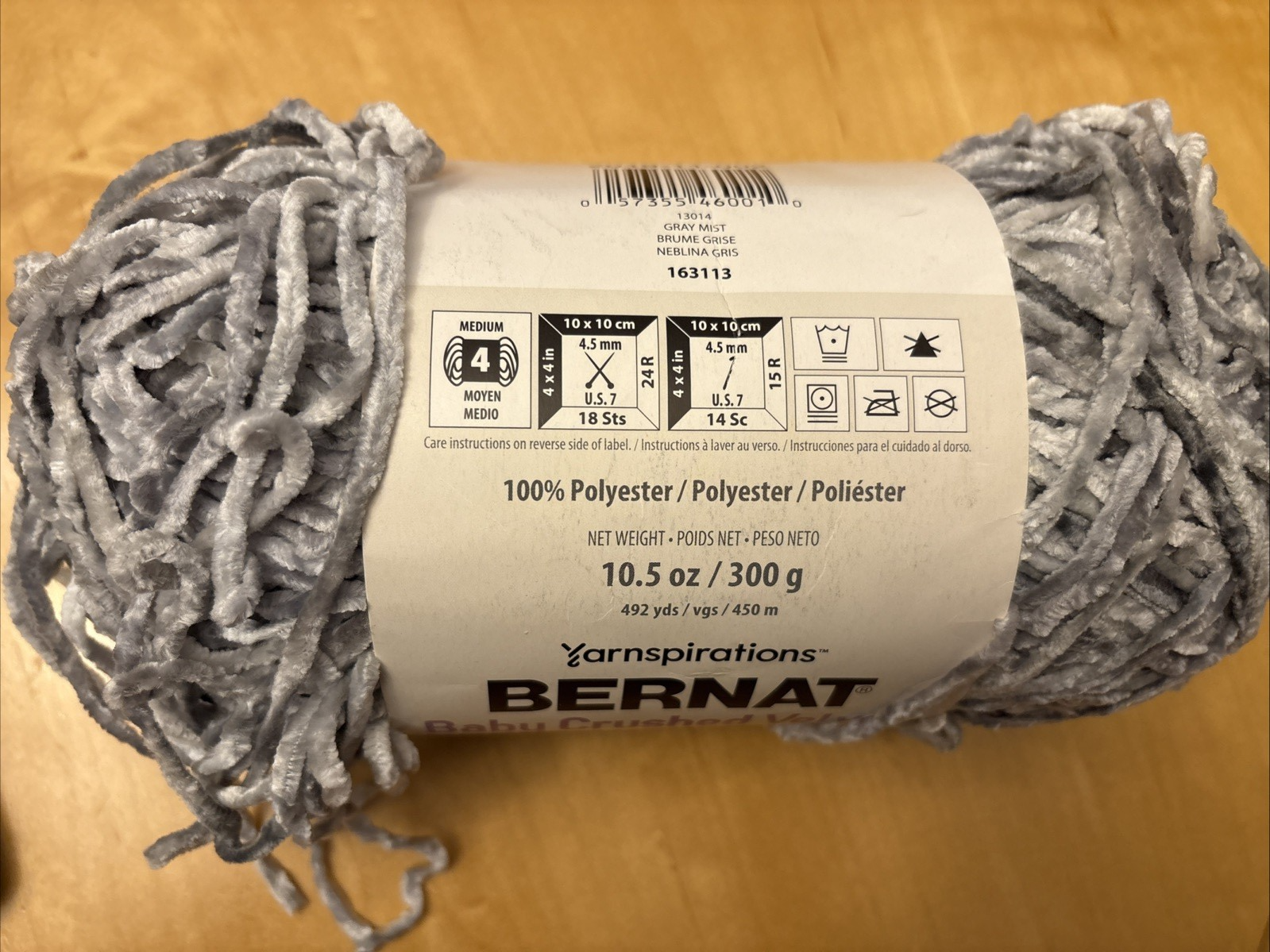 Grey Mist Bernat Baby Crushed Velvet yarn, color #13014, 10.5 oz, in clear packaging with black label and white text.