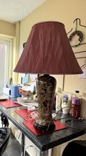 Antique table lamp with a patterned ceramic base in vintage style