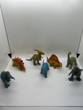 7 piece dinosaur set,6 inches by 4 inches is sizes. Great condion,