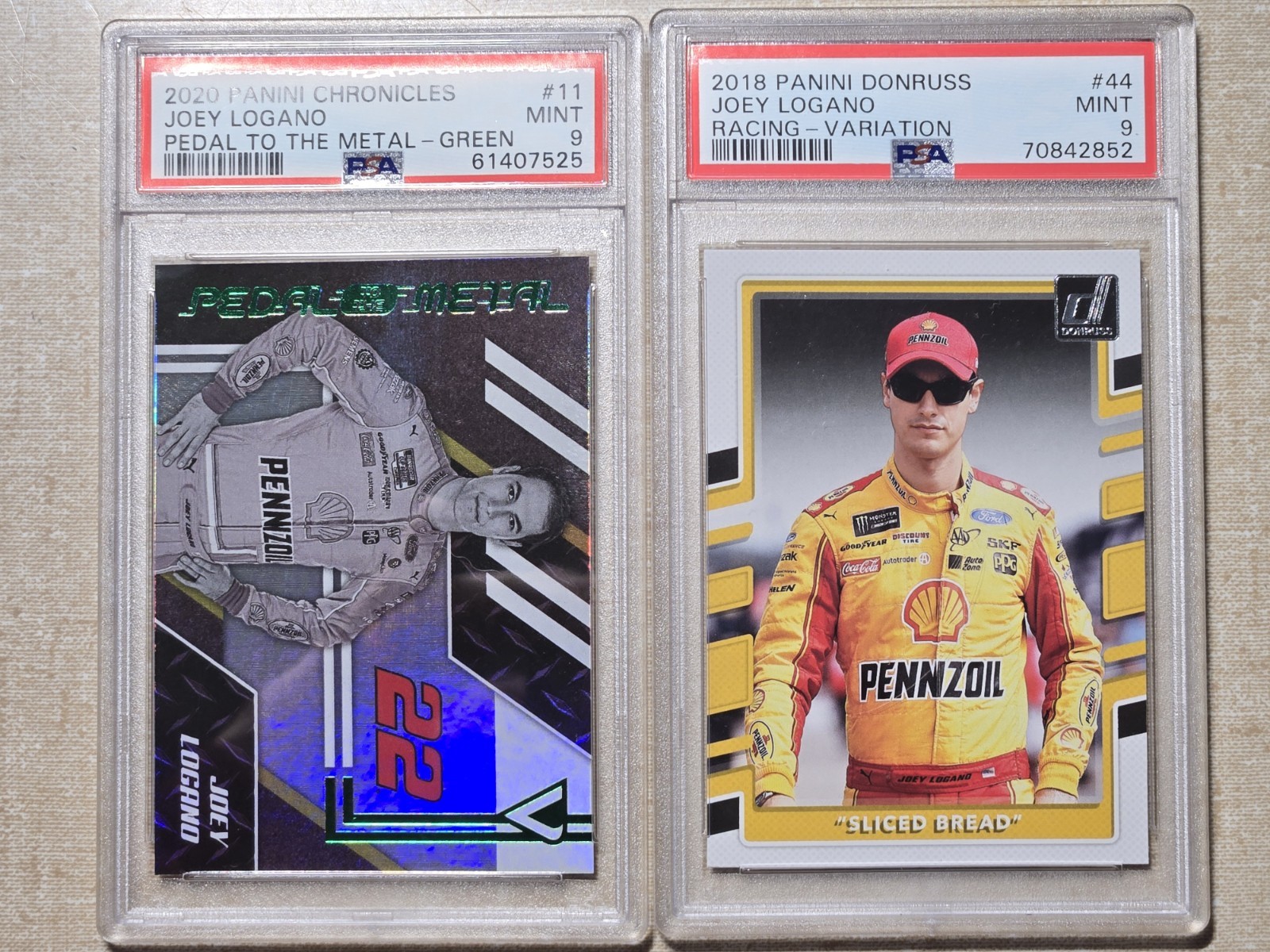 Joey Logano - two PSA 9 graded cards: 20 Chronicles + 18 Donruss "sliced bread" view 1