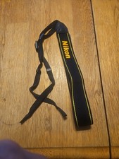 VINTAGE NIKON WIDE CLEAN BLACK STRAP WITH YELLOW LOGO MEASURES APPROX 97CM