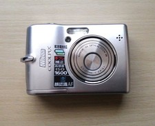 Nikon COOLPIX L12 Digital Camera SD Card Slot AA Battery Used Compact