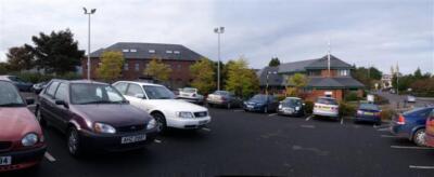 Photo 6x4 Car park, Technology Centre, Omagh An Oghmagh The brick buildin c2007
