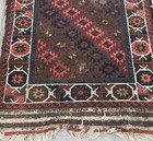 AN ANTIQUE BALUCHSTAN TRIBAL RUG — photo 6