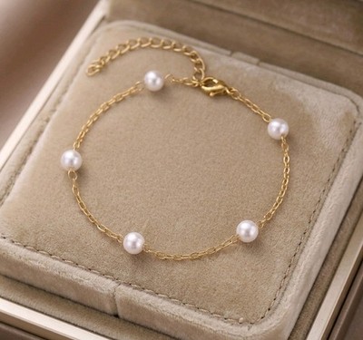  Zierliches Armband mit goldenen Perlen verstellbar 