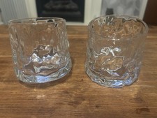 Image of Pair of rotating whiskey glasses