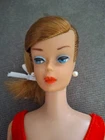 Barbie Original 1960s swirl ponytail Midge doll in the iconic red swimsuit