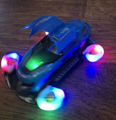 Race Car With Lights & sound Lifts Of Ground And Spins Bump And Go Doors Open
