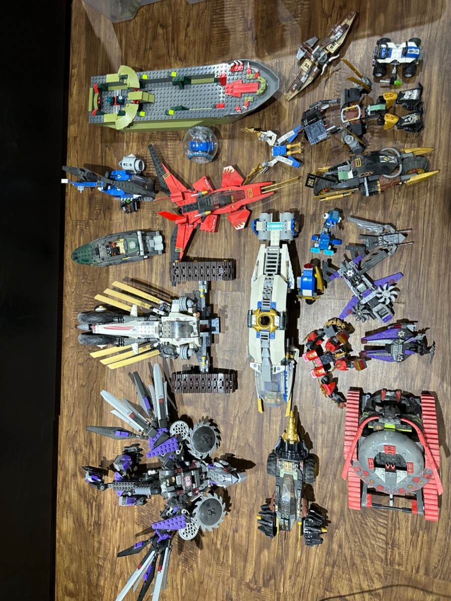 lego lot includes ninjago, chima, Jurassic park, Lego movie, city, and 