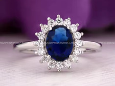 Simulated Blue Sapphire Oval Women's Halo Engagement Ring s925 14kW/G Plated