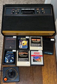 Vintage Atari 2600 4-Switch Woodgrain Console Bundle with Controllers & 7 Games
