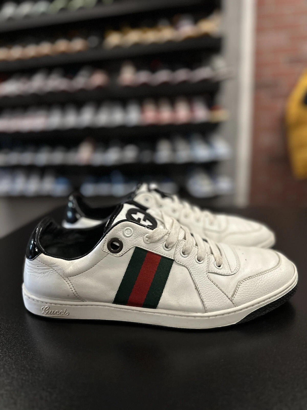 Baskets basses Gucci cuir blanc/noir détail Ace Web pointure 9,5G/10US