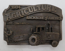 BELT BUCKLE Agriculture The Backbone of America 1984 tractor farmer field vtg