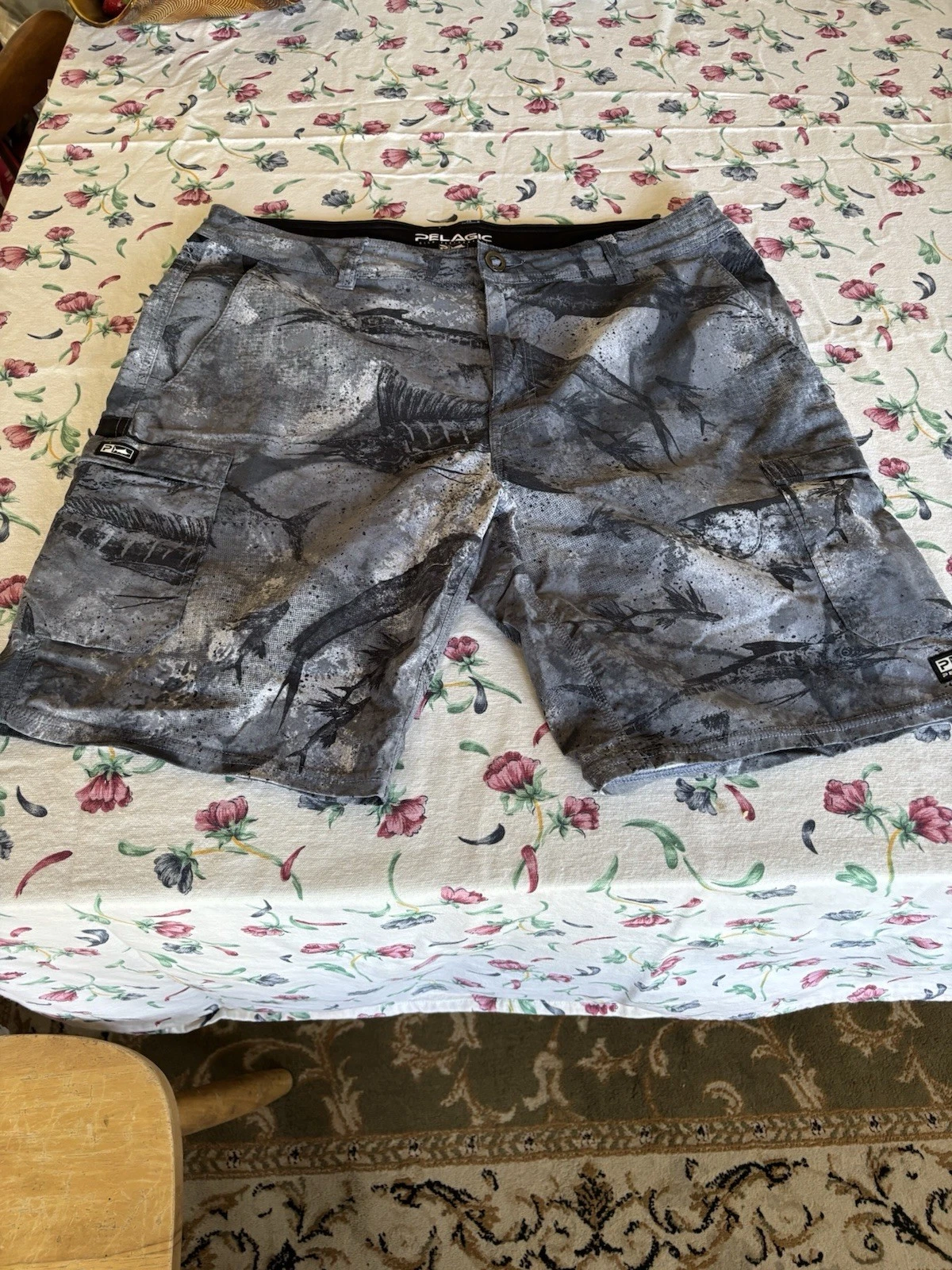 Pelagic Madeira Cargo Hybrid fishing shorts grey fish print camouflage pattern.
Opens in a new windo