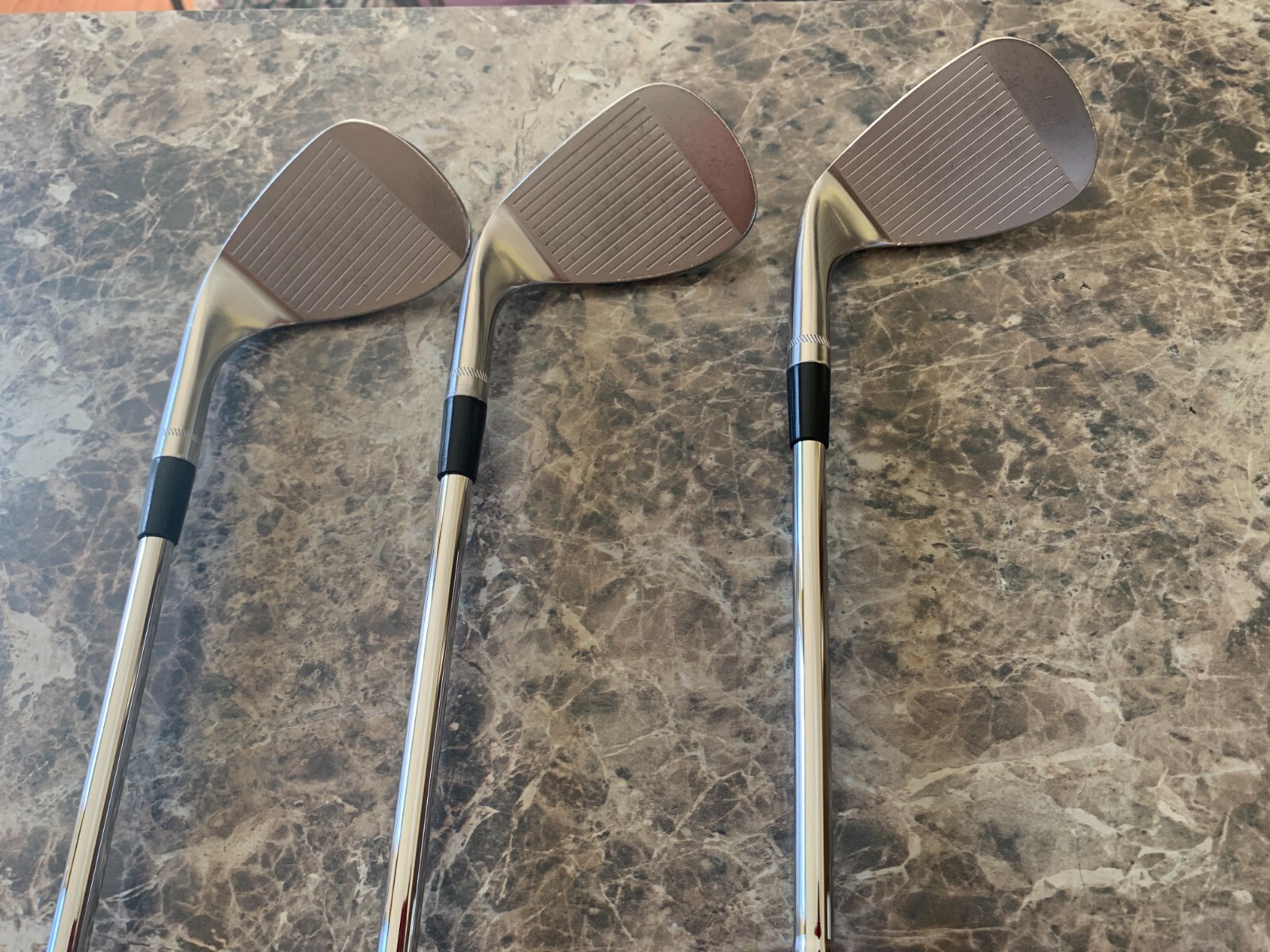 Kirkland golf wedge set 60 56 52. Excellent Golf pride mid size grips