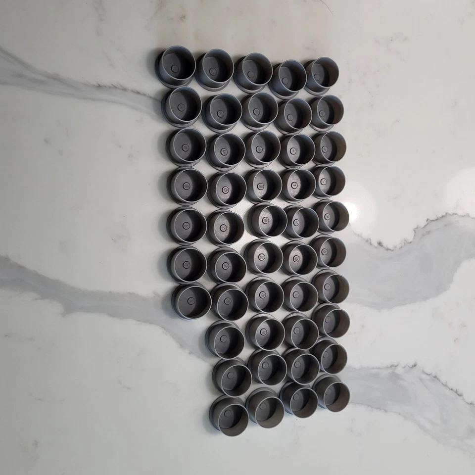 Lot: 47x Gray 1" x 4" pool fence sleeves & covers. New. UV rated Niagra brand - Image 3 of 4