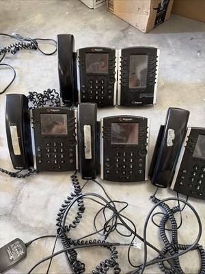 Business Phone System- 8 VOIP Phones and 1 VOIP Modem.