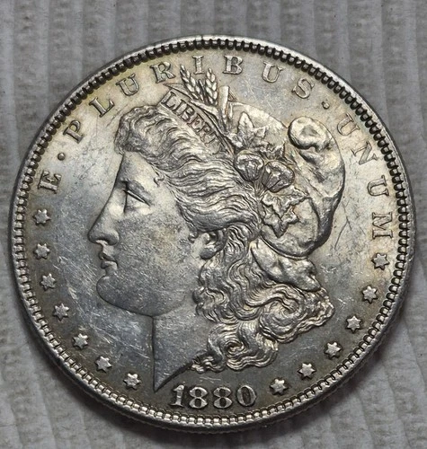 1880 P Morgan Silver Dollar. Estimated  Uncirculated Mint State 62 . M0125.