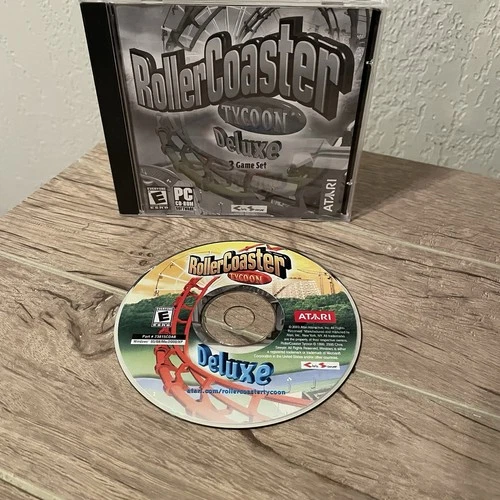 Rollercoaster Tycoon Deluxe Edition Atari 2005 PC Computer Video Game