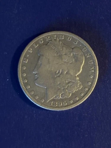 1886- O MORGAN SILVER DOLLAR VG