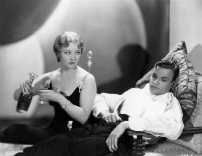 Betty Compson pours a drunken looking John Darrow a drink a c- 1926 Old Photo