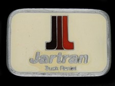 UC11173 NOS VINTAGE 1970s JARTRAN TRUCK RENTAL ADVERTISEMENT BELT BUCKLE