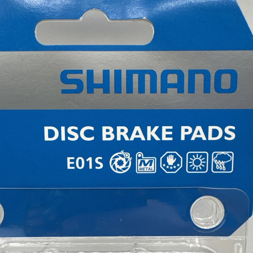 Pastillas de freno de disco de metal Shimano E01S y resorte para Deore BRM575, BRM486, BRM485 Foto 2 de 4