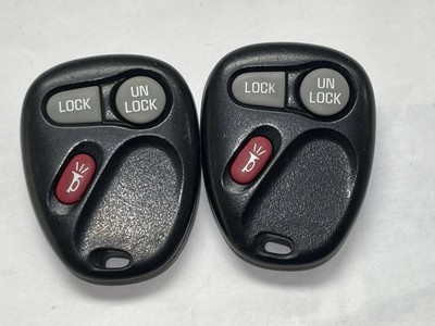 LOT OF 2 GMC SIERRA YUKON DENALY KEYLESS REMOTES TRANSMITTERS 15042968 GMC OEM 