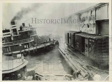 1951 Press Photo Philadelphia fireboat battles a blazing barge on Delaware River