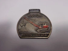 VINTAGE ANTIQUE MARION POWER SHOVEL CO. METAL WATCH FOB ~ MARION OHIO U.S.A.