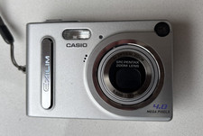 Casio Exilim EX-Z4 Digital Camera boxed w/ manual, charging cradle, case, etc