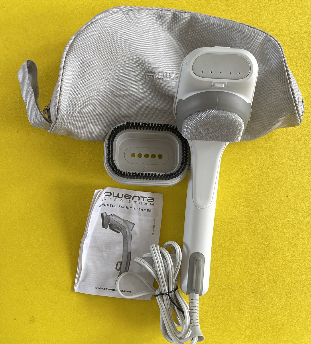 Rowenta Steamer Mode d'emploi des vêtements portatifs