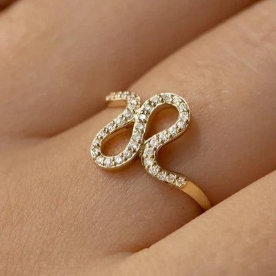 0.25TCW Round Cut White Moissanite Infinity Sparkle Ring Pure 10K Yellow Gold FN