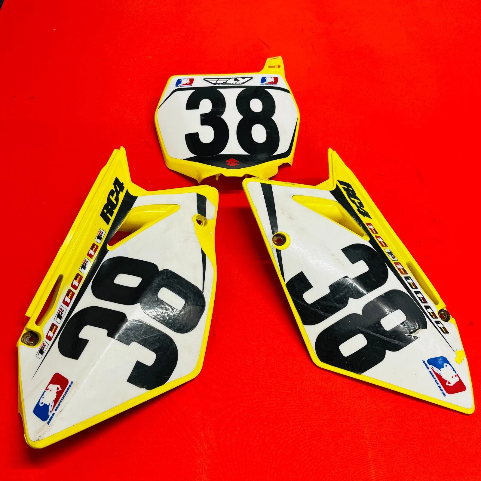 RMZ450 NUMBER PLATES PLASTICS COVERS RC4 GENUINE OEM SUZUKI RMZ 450 (2005-2007)