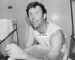 Tommy John National Leagues' Winningest Pitcher Chills His Elbow in Ice Photo